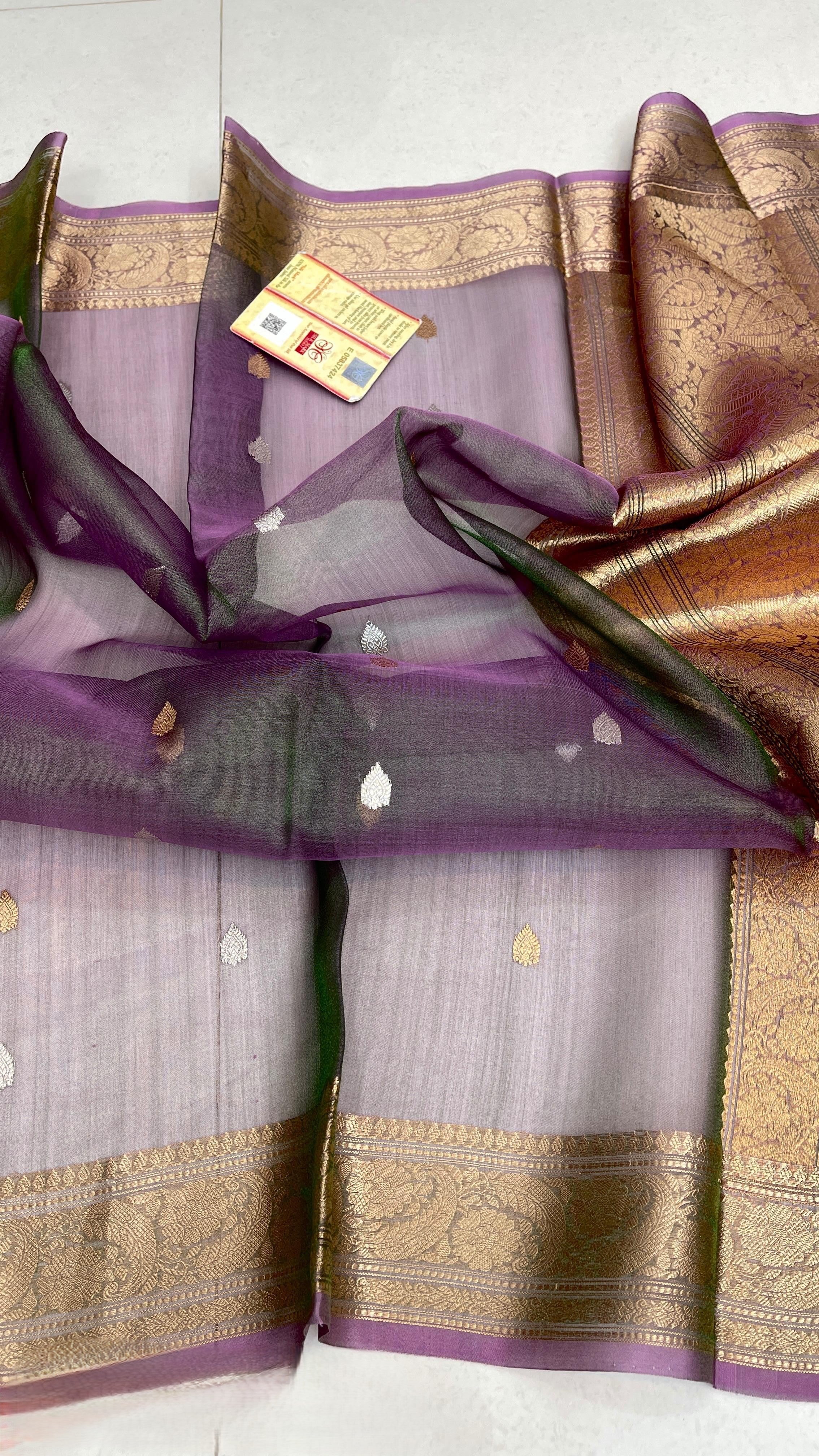 Dual Tone Purple Banarasi Handloom Kora Tissue Silk Saree featuring all-over gold and silver zari buttas, intricate gold zari borders, and a matching rich pallu.