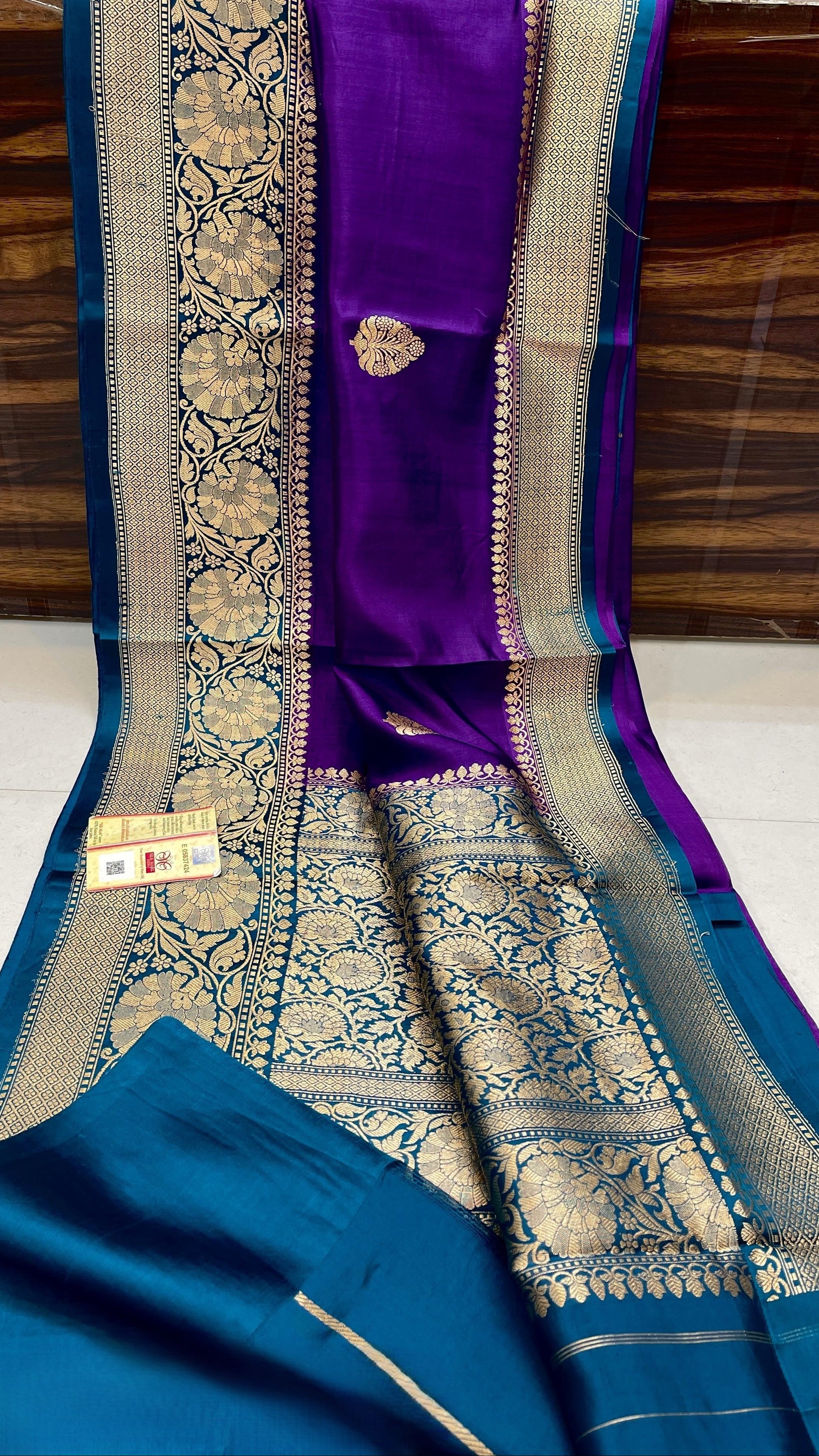 Dark Purple Banarasi handloom raw mango silk saree featuring rich gold mashru borders and intricate Kaduwa weaving.