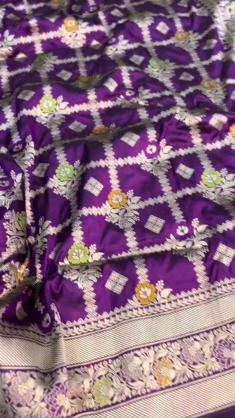 Regal Purple Banarasi Handloom Katan Silk saree with intricate multi-colored Meenakari floral motifs and detailed silver zari borders.