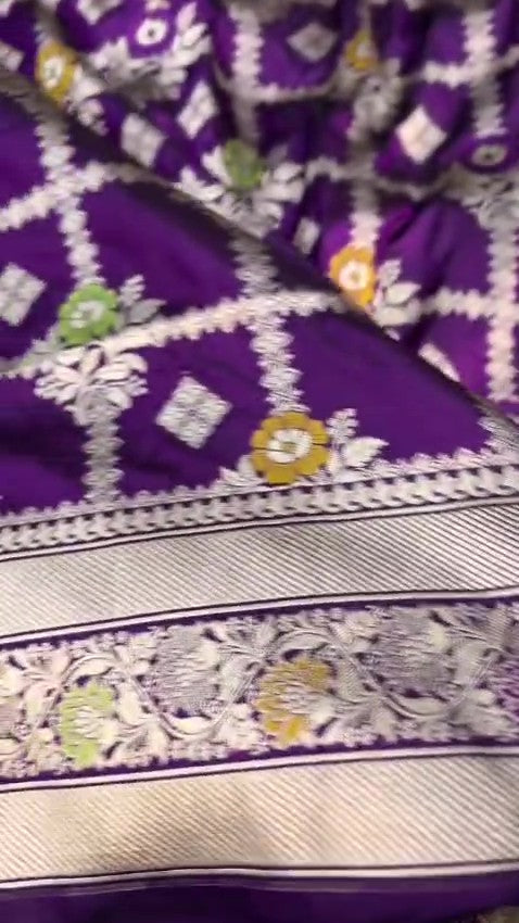 Regal Purple Banarasi Handloom Katan Silk saree with intricate multi-colored Meenakari floral motifs and detailed silver zari borders.