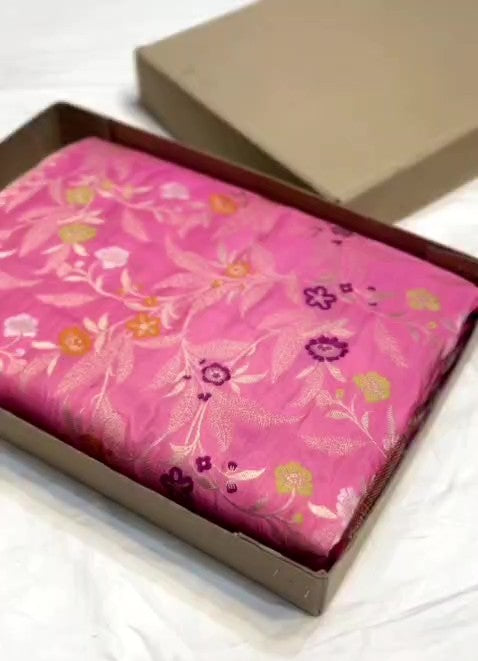 Dark pink Banarasi handloom pure katan silk saree featuring intricate gold zari weaving and colorful Meenakari floral motifs.