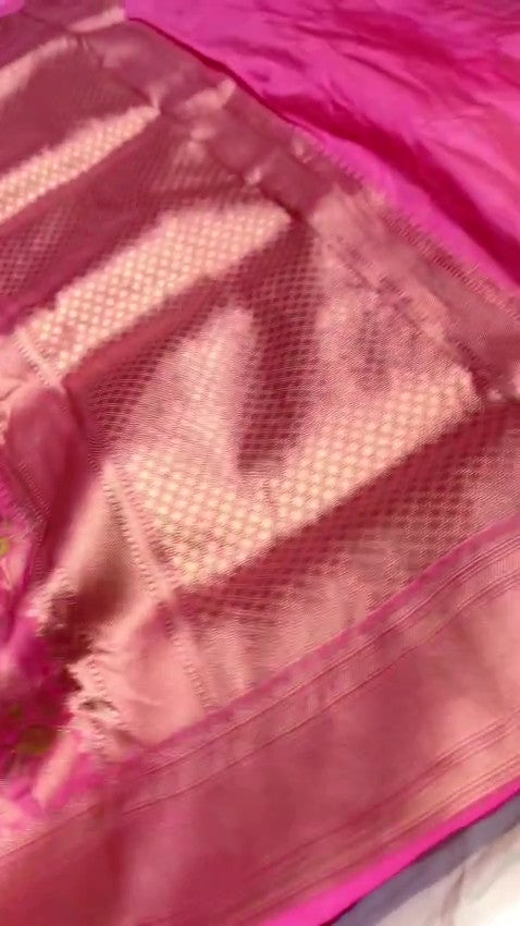 Dark pink Banarasi handloom pure katan silk saree featuring intricate gold zari weaving and colorful Meenakari floral motifs.