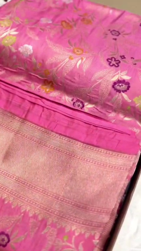 Dark pink Banarasi handloom pure katan silk saree featuring intricate gold zari weaving and colorful Meenakari floral motifs.