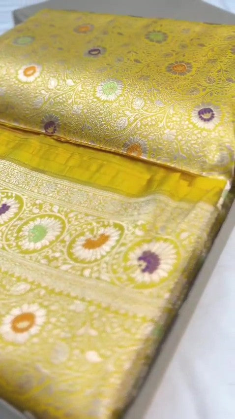 Yellow Banarasi Handloom Pure Katan Silk Saree with intricate floral jaal weave and colorful Meenakari bootis.