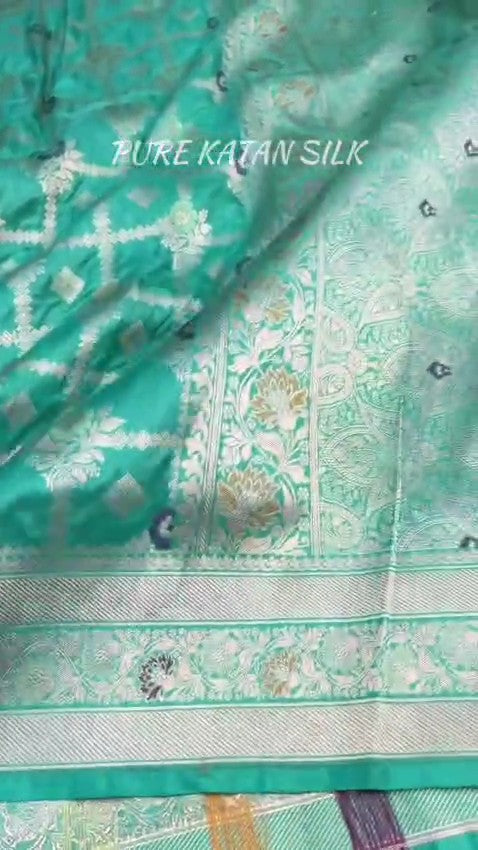 Sea Green Banarasi Handloom Pure Katan Silk Saree featuring all-over check weaves and Meenakari floral work.