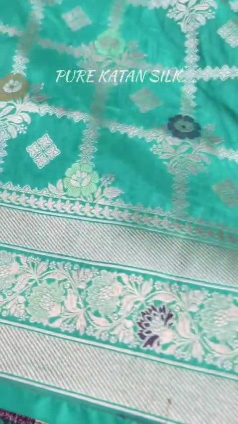 Sea Green Banarasi Handloom Pure Katan Silk Saree featuring all-over check weaves and Meenakari floral work.