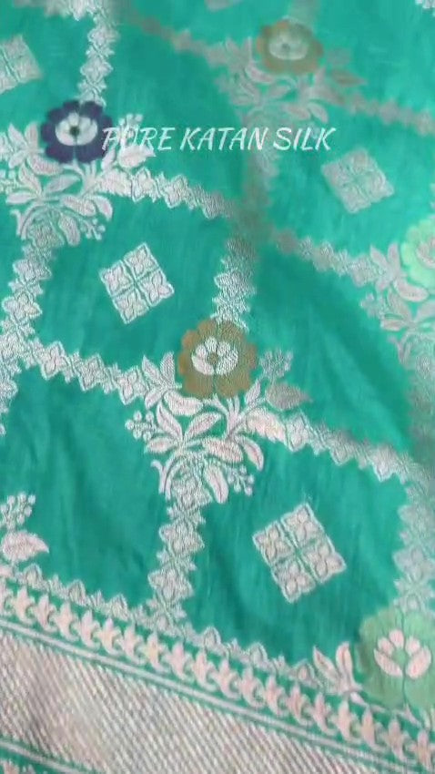 Sea Green Banarasi Handloom Pure Katan Silk Saree featuring all-over check weaves and Meenakari floral work.
