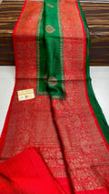 Banarasi handloom raw silk Kaduwa saree featuring intricate gold zari floral motifs and rich contrast borders, available in multiple color options with Silk Mark certification.