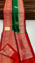 Banarasi handloom raw silk Kaduwa saree featuring intricate gold zari floral motifs and rich contrast borders, available in multiple color options with Silk Mark certification.