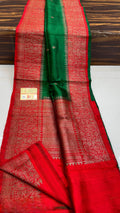 Banarasi handloom raw silk Kaduwa saree featuring intricate gold zari floral motifs and rich contrast borders, available in multiple color options with Silk Mark certification.