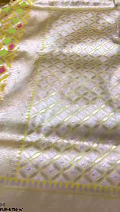 Radiant yellow Banarasi handloom pure katan silk saree featuring intricate gold zari and meenakari weaving