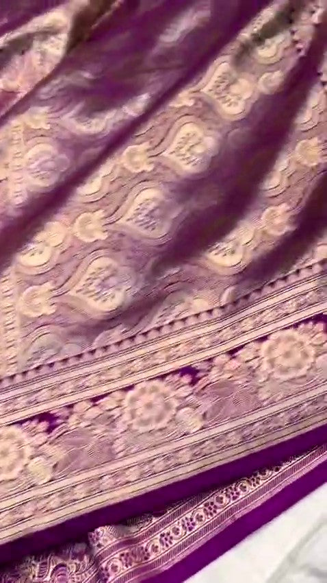 Dual-tone purple and magenta Banarasi Mashru soft silk saree featuring intricate copper zari borders, floral buta motifs, and a matching blouse