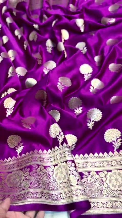 Dual-tone purple and magenta Banarasi Mashru soft silk saree featuring intricate copper zari borders, floral buta motifs, and a matching blouse