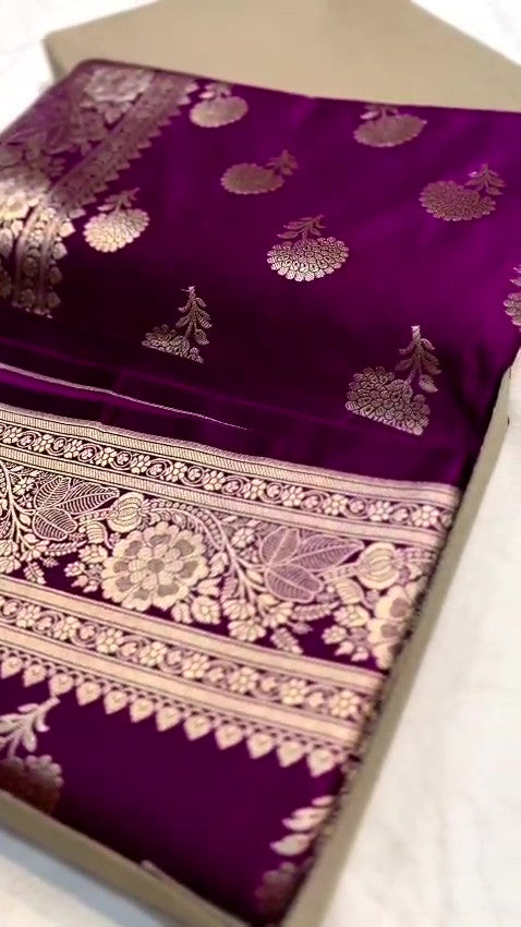 Dual-tone purple and magenta Banarasi Mashru soft silk saree featuring intricate copper zari borders, floral buta motifs, and a matching blouse