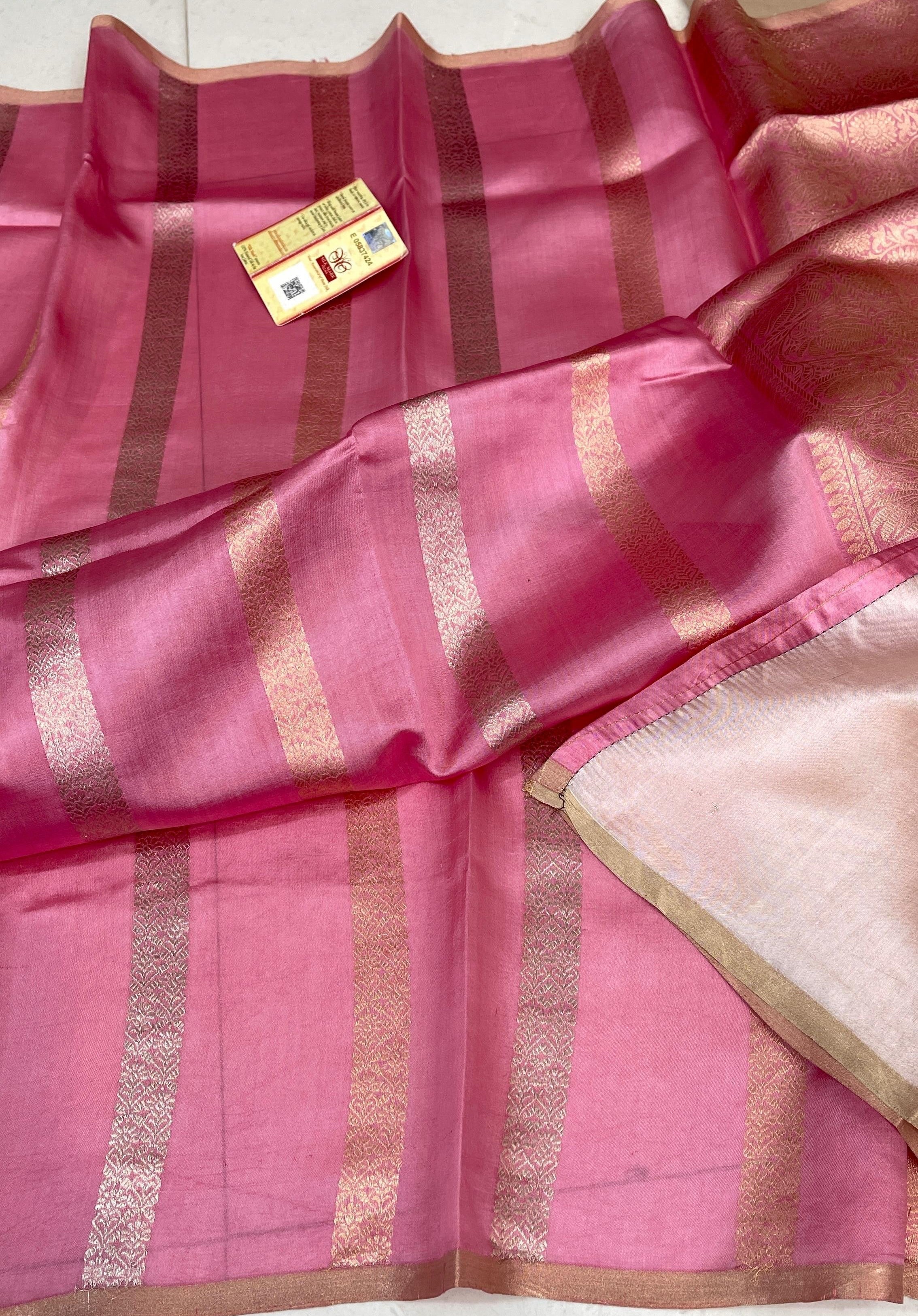 Vibrant Dark Pink Banarasi Raw Mango Silk saree with gold zari circular butas and a wide gold Mashru border, paired with a matching pink blouse.