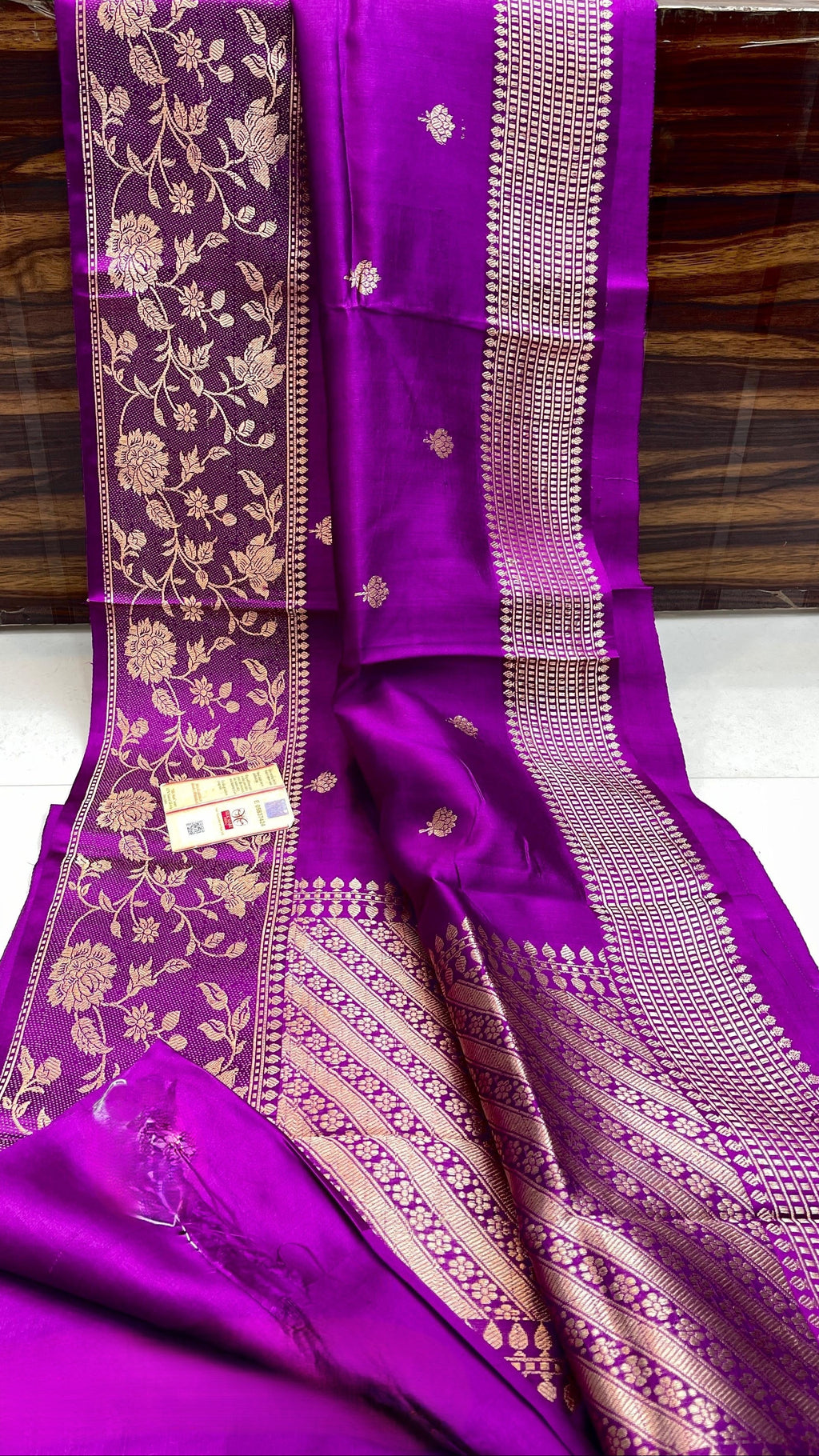 vibrant purple Banarasi handloom raw mango silk saree featuring rich gold mashru borders and intricate Kaduwa weaving.