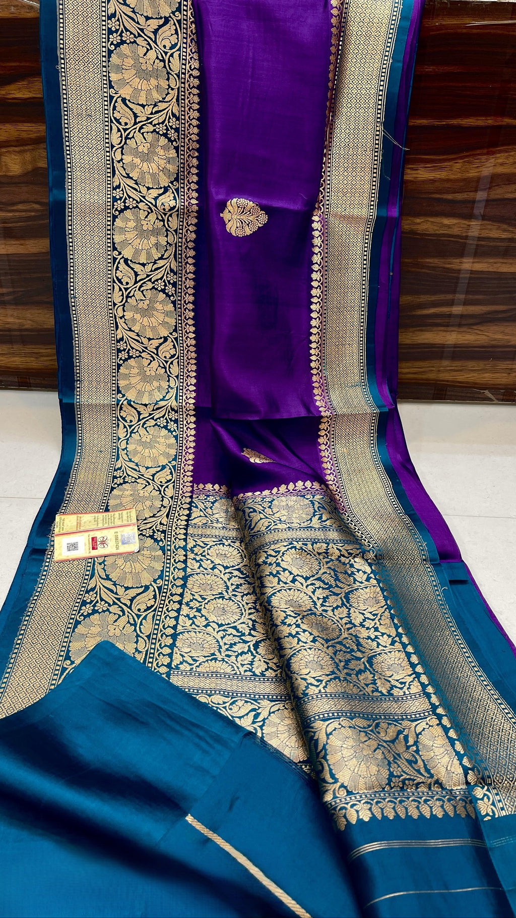 Dark Purple Banarasi handloom raw mango silk saree featuring rich gold mashru borders and intricate Kaduwa weaving.