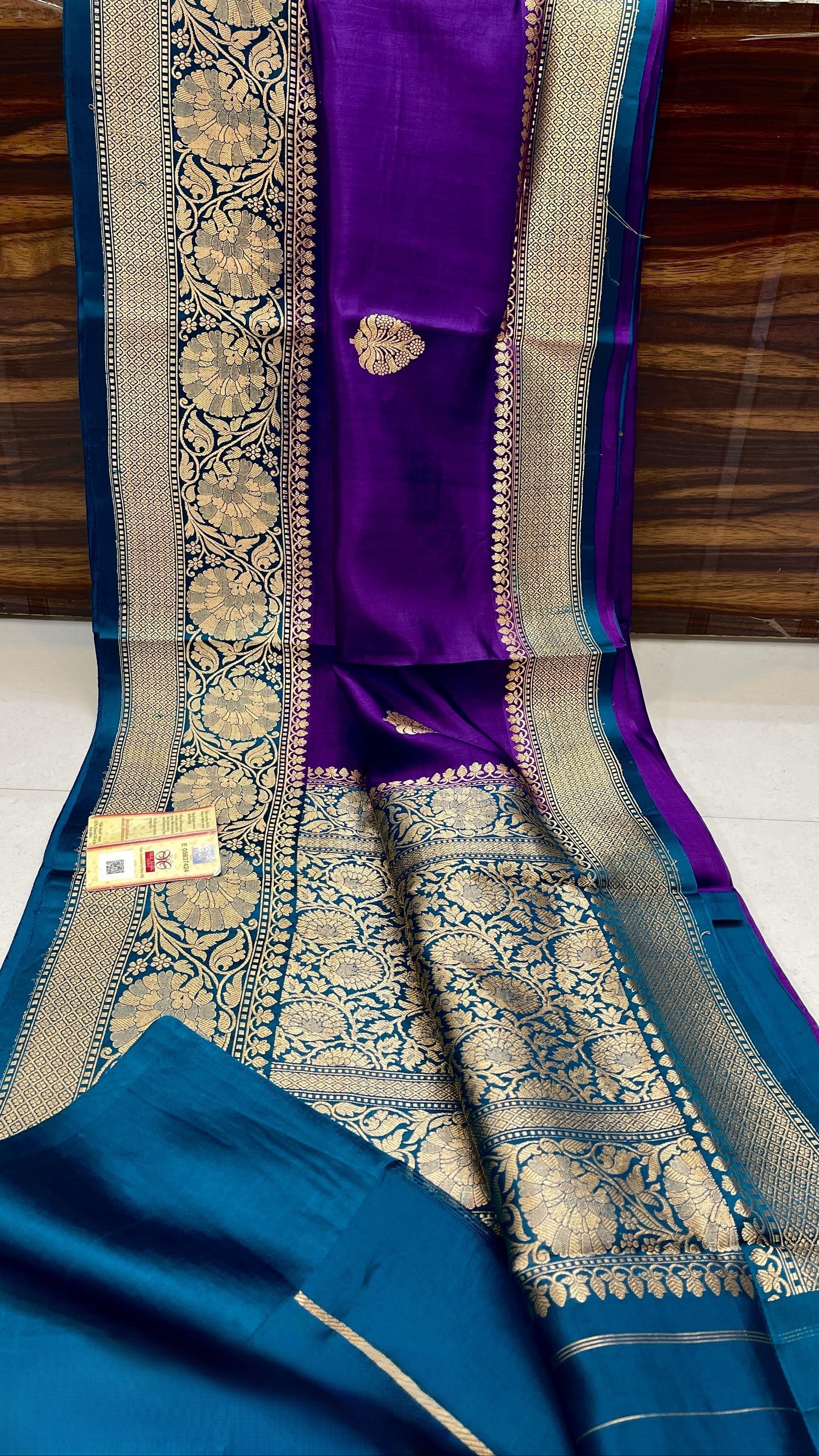 Dark Purple Banarasi handloom raw mango silk saree featuring rich gold mashru borders and intricate Kaduwa weaving.