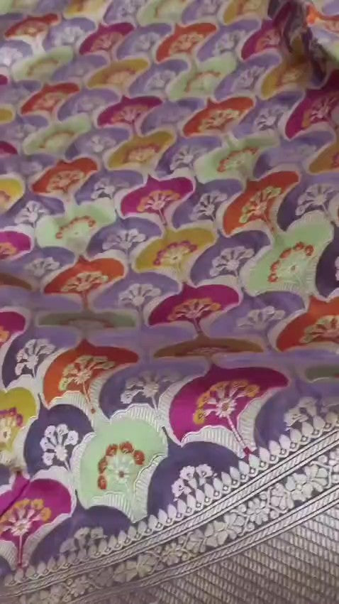 Lavender Banarasi handloom katan silk rangkaat meenakari saree featuring intricate zari weaving.