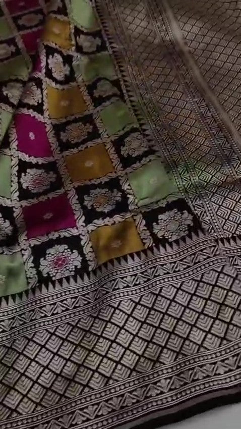 Black Banarasi Handloom Rangkaat Katan Silk Saree featuring multicolored checks, intricate motifs, and a rich silver zari pallu.