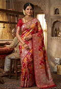 A majestic red Banarasi Katan silk saree with Rangkaat multi-color diagonal patterns and intricate hand-woven Meenakari floral jal.