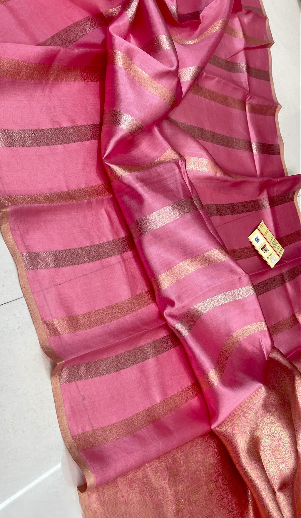 Vibrant Dark Pink Banarasi Raw Mango Silk saree with gold zari circular butas and a wide gold Mashru border, paired with a matching pink blouse.