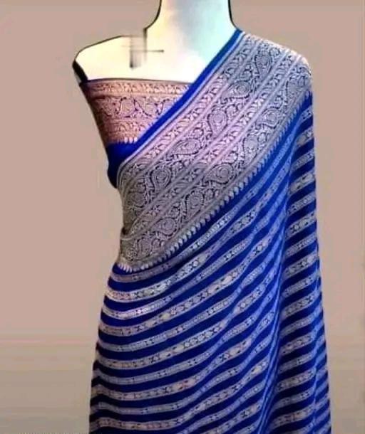 Elegant dyeable Banarasi handloom georgette silk saree featuring delicate antique zari weaving customized in your choice of color.
