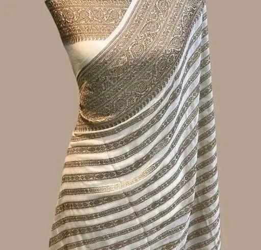 Elegant dyeable Banarasi handloom georgette silk saree featuring delicate antique zari weaving customized in your choice of color.