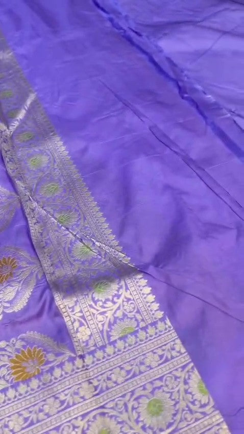 Violet Banarasi handloom pure Chiniya silk saree featuring elaborate silver and gold sona roopa meenakari floral motifs and a broad zari border.