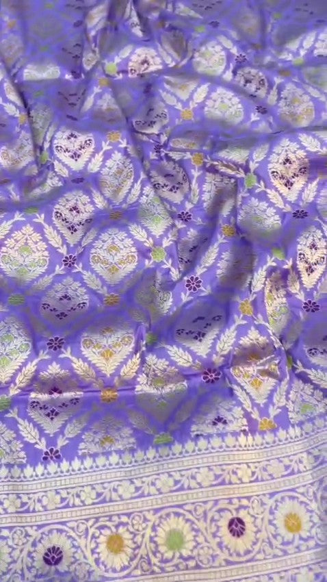 Violet Banarasi handloom pure Chiniya silk saree featuring elaborate silver and gold sona roopa meenakari floral motifs and a broad zari border.