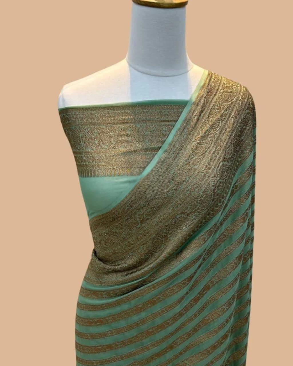 Elegant dyeable Banarasi handloom georgette silk saree featuring delicate antique zari weaving customized in your choice of color.