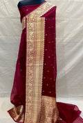 Banarasi Handloom Kora Organza Silk Saree in deep green with intricate zari Kaduwa floral motifs and a rich contrast red brocade border with Silk Mark tag.