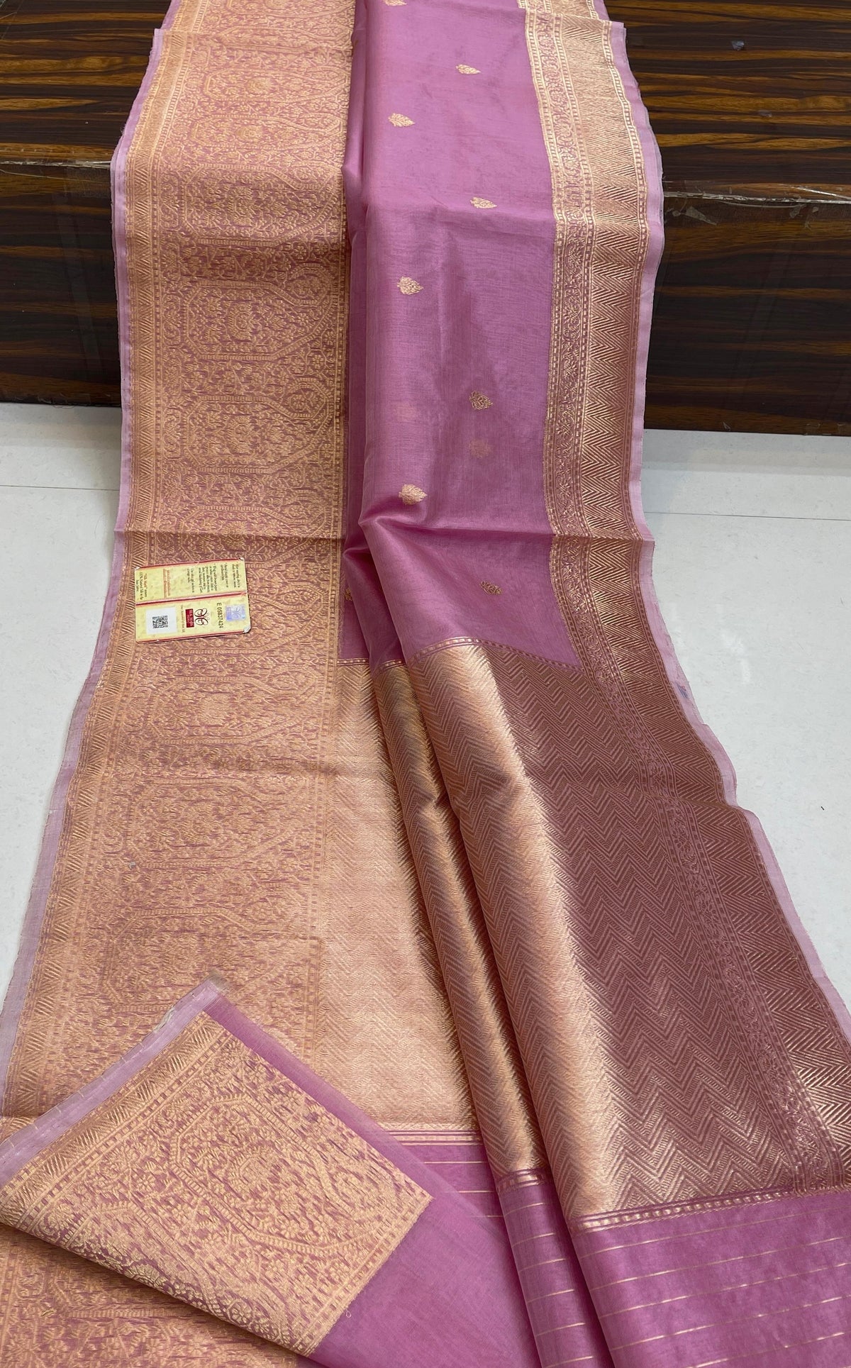 Banarasi Handloom Kora Organza Silk Saree in deep green with intricate zari Kaduwa floral motifs and a rich contrast red brocade border with Silk Mark tag