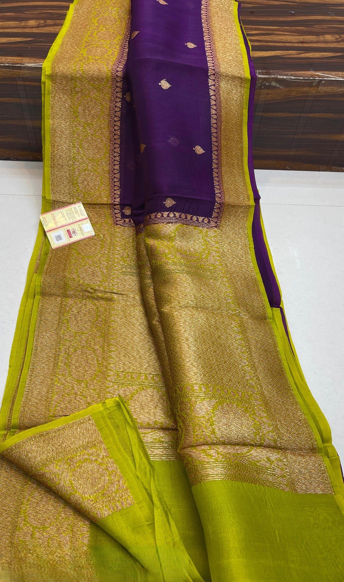 Banarasi Handloom Kora Organza Silk Saree in deep green with intricate zari Kaduwa floral motifs and a rich contrast red brocade border with Silk Mark tag