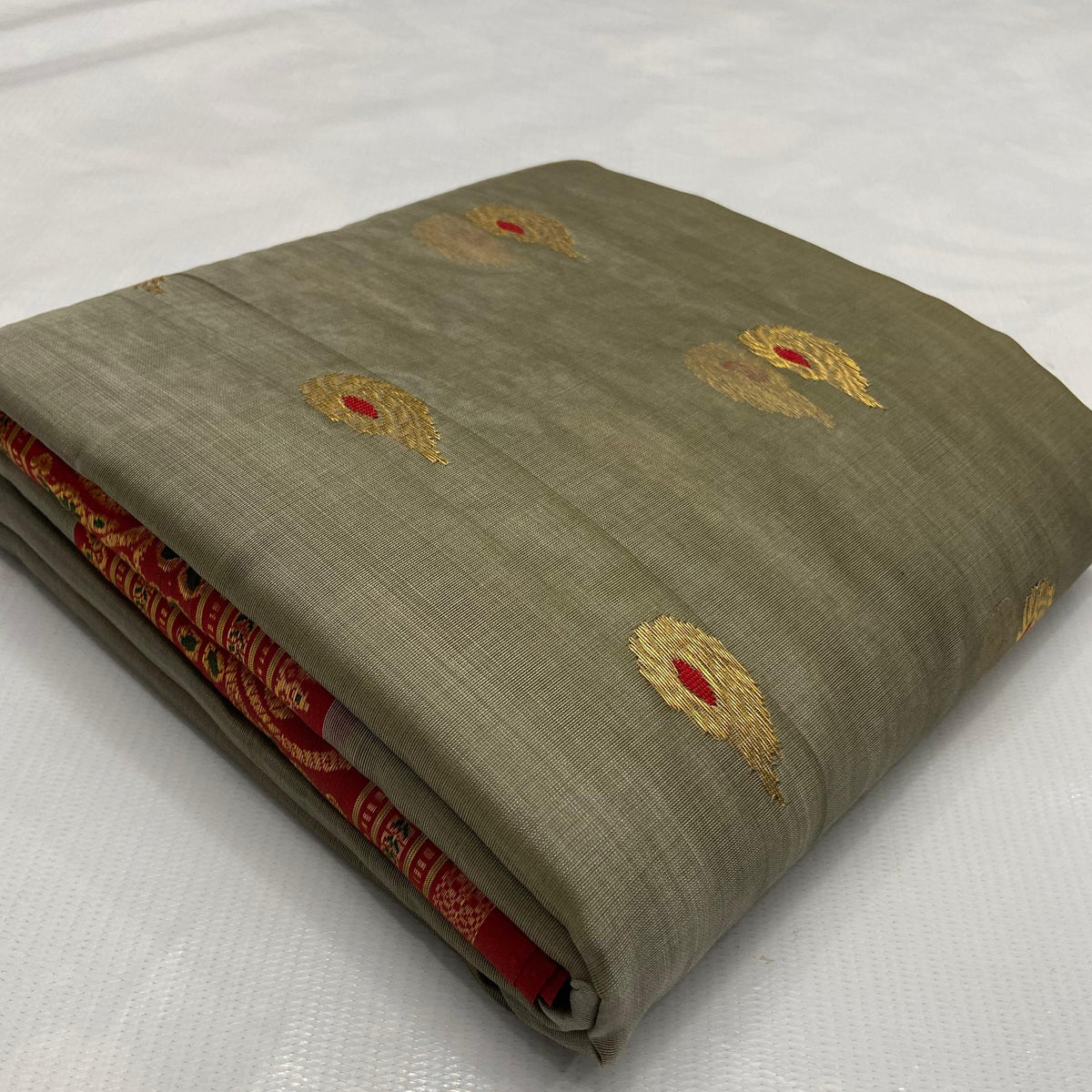 Grey Chanderi Handloom Katan Silk Meenakari Saree featuring gold zari bootis and a rich red border