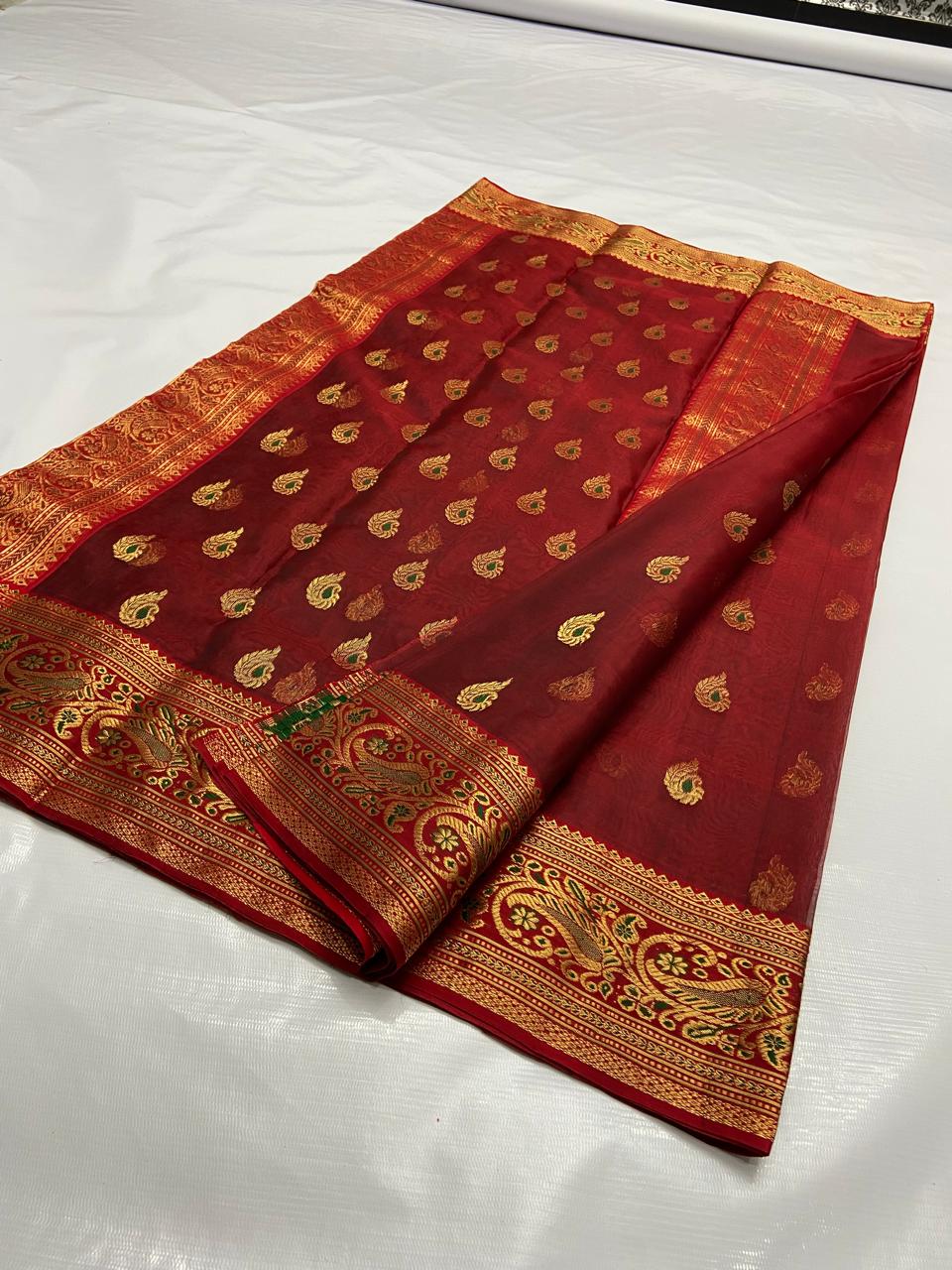 Maroon Chanderi Handloom Katan Silk Nakshi Meenakari Saree featuring intricate gold zari and rich traditional borders