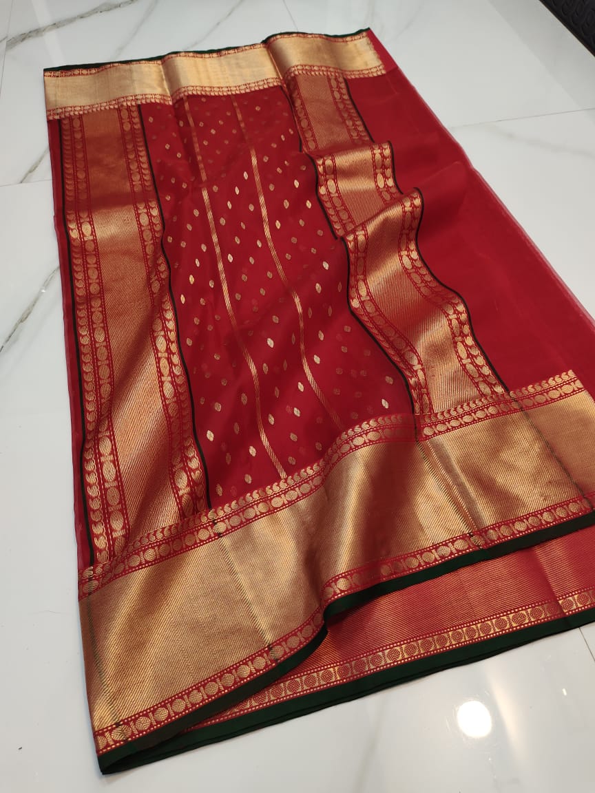 Red Chanderi Handloom Katan Silk Nakshi Saree featuring elegant gold zari bootis and a rich traditional border