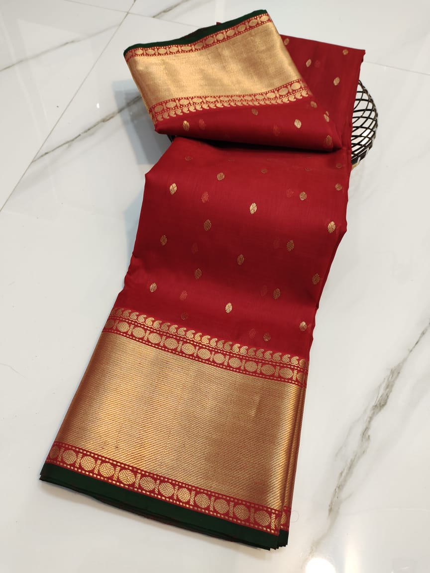 Red Chanderi Handloom Katan Silk Nakshi Saree featuring elegant gold zari bootis and a rich traditional border