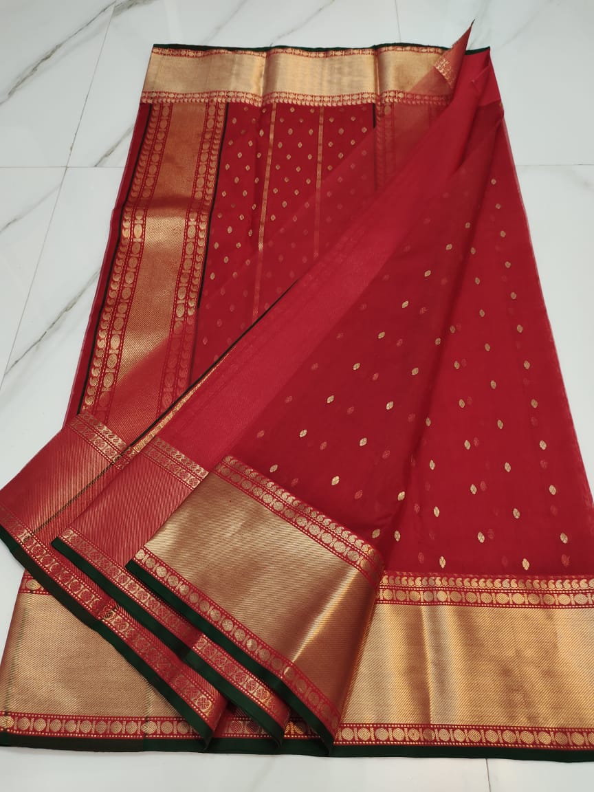 Red Chanderi Handloom Katan Silk Nakshi Saree featuring elegant gold zari bootis and a rich traditional border