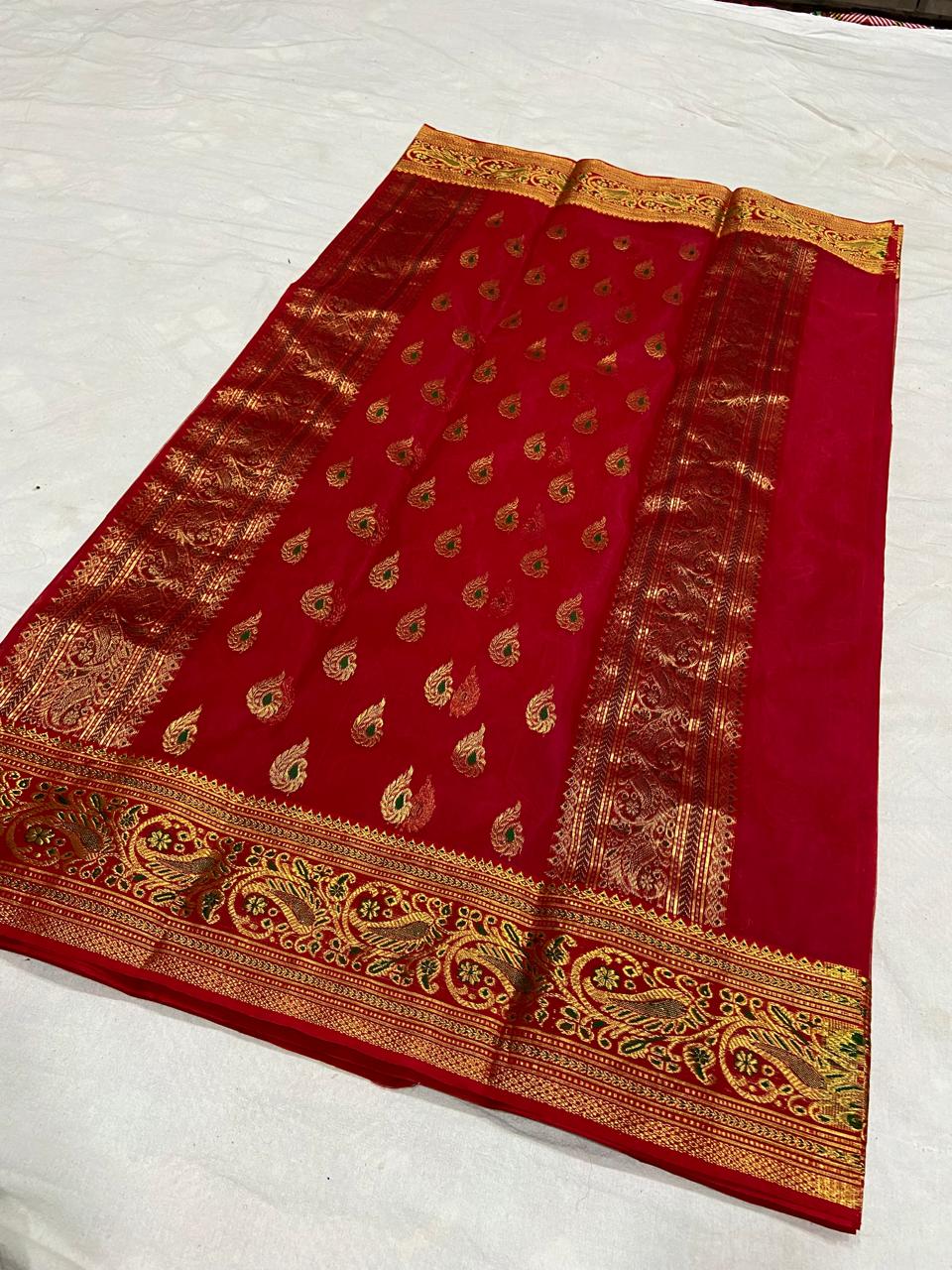 Red Chanderi Handloom Katan Silk Nakshi Meenakari Saree featuring intricate gold zari and rich traditional borders