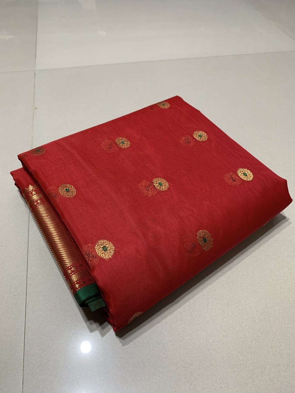 Red Chanderi handloom katan silk saree featuring intricate meenakari and nakshi weaving work.