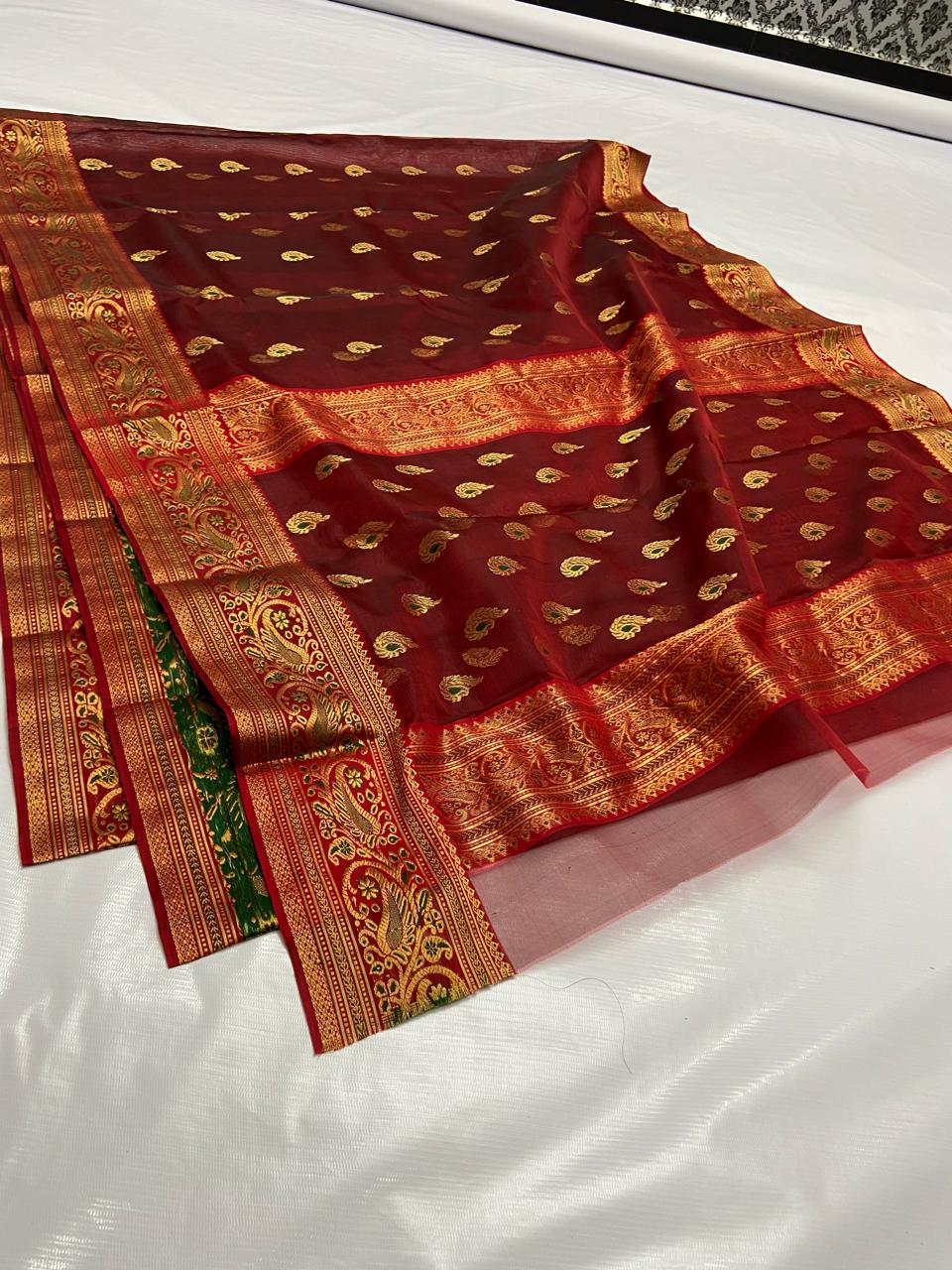 Maroon Chanderi Handloom Katan Silk Nakshi Meenakari Saree featuring intricate gold zari and rich traditional borders