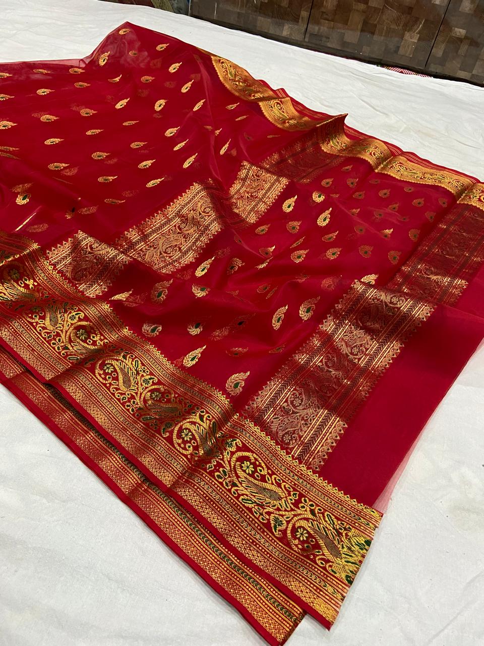 Red Chanderi Handloom Katan Silk Nakshi Meenakari Saree featuring intricate gold zari and rich traditional borders