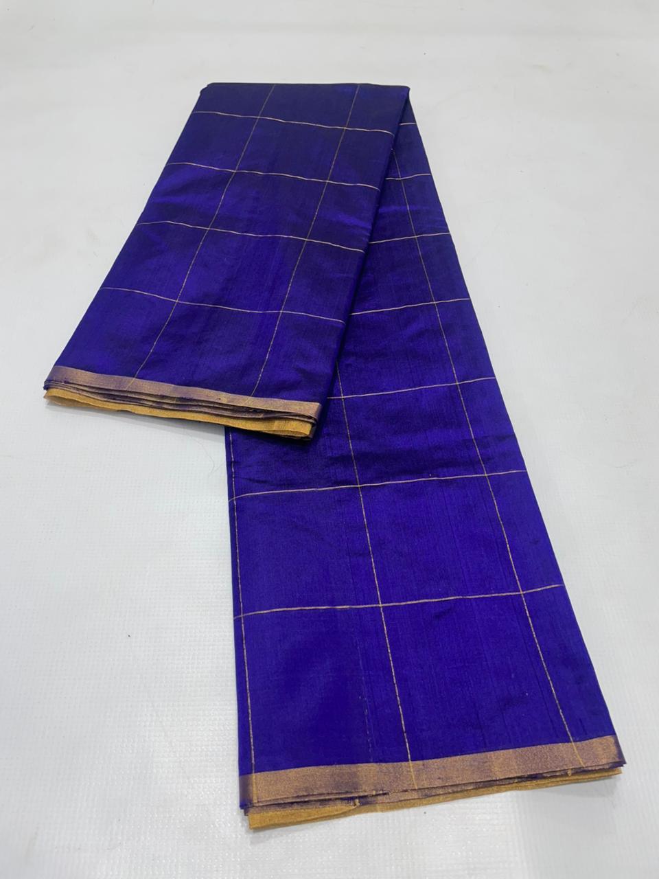 Midnight Blue Chanderi handloom pattu silk saree featuring all over zari checks in the body and traditional rich zari weaving.