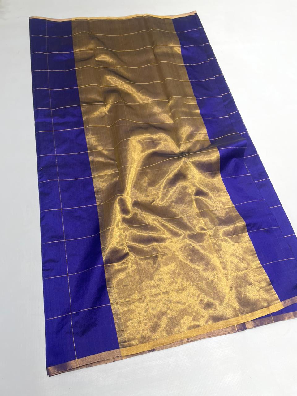 Midnight Blue Chanderi handloom pattu silk saree featuring all over zari checks in the body and traditional rich zari weaving.