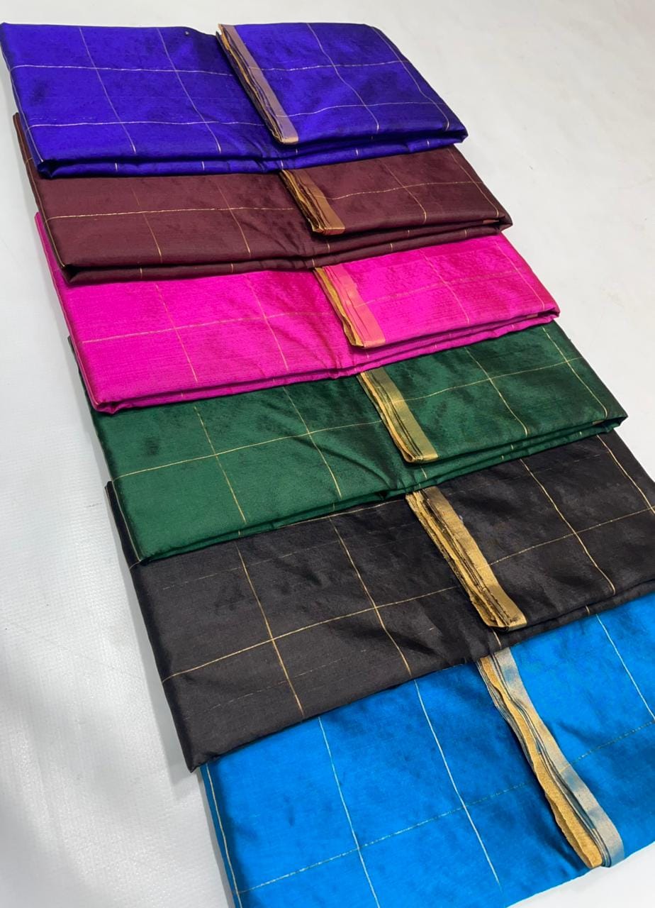 Midnight Blue Chanderi handloom pattu silk saree featuring all over zari checks in the body and traditional rich zari weaving.
