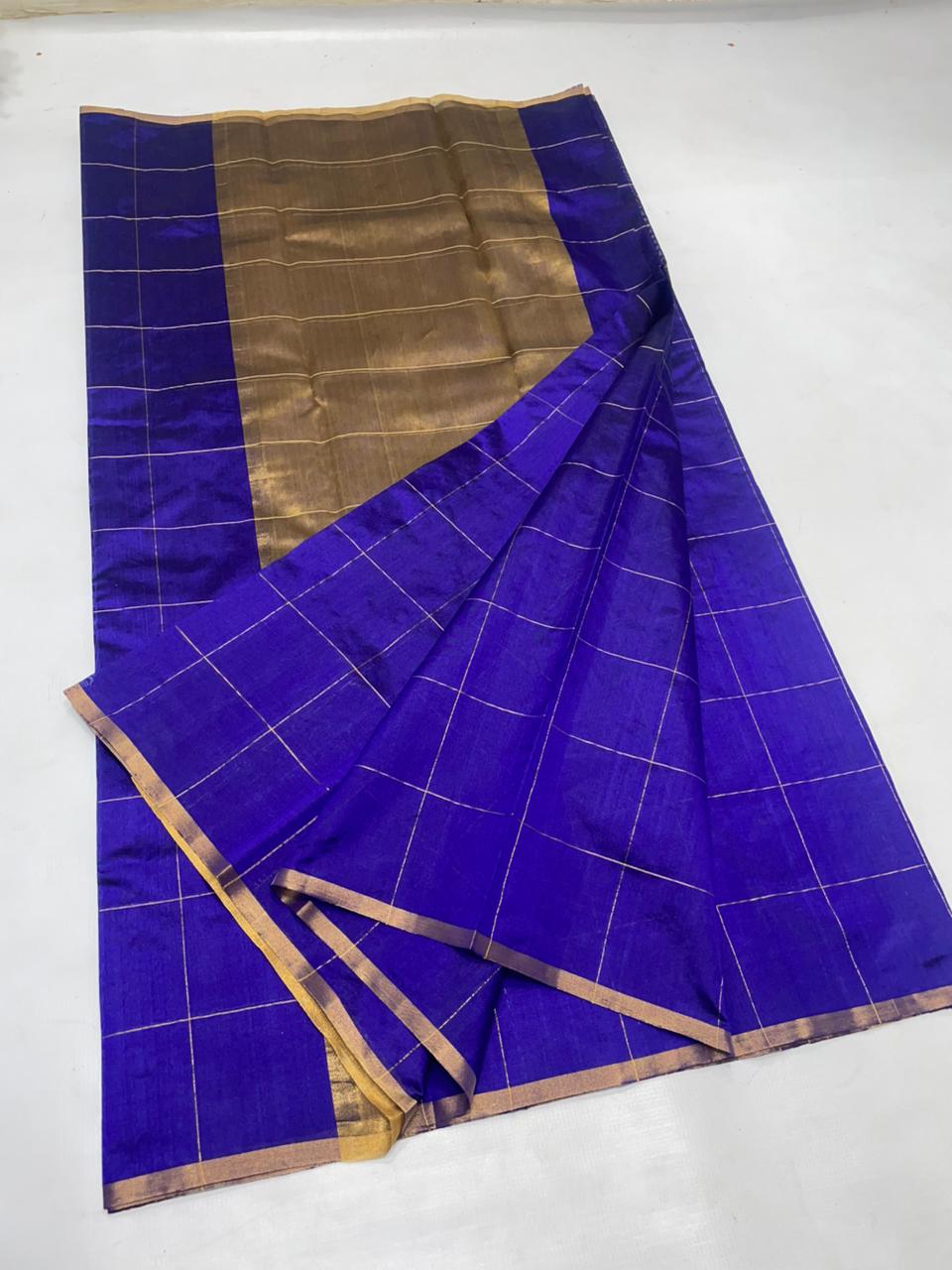 Midnight Blue Chanderi handloom pattu silk saree featuring all over zari checks in the body and traditional rich zari weaving.