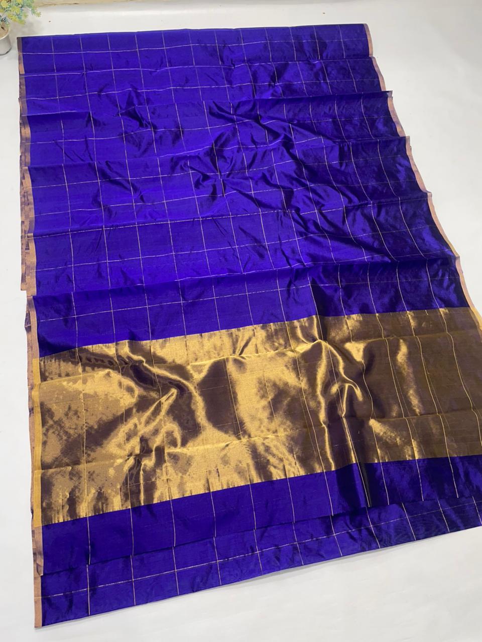 Midnight Blue Chanderi handloom pattu silk saree featuring all over zari checks in the body and traditional rich zari weaving.