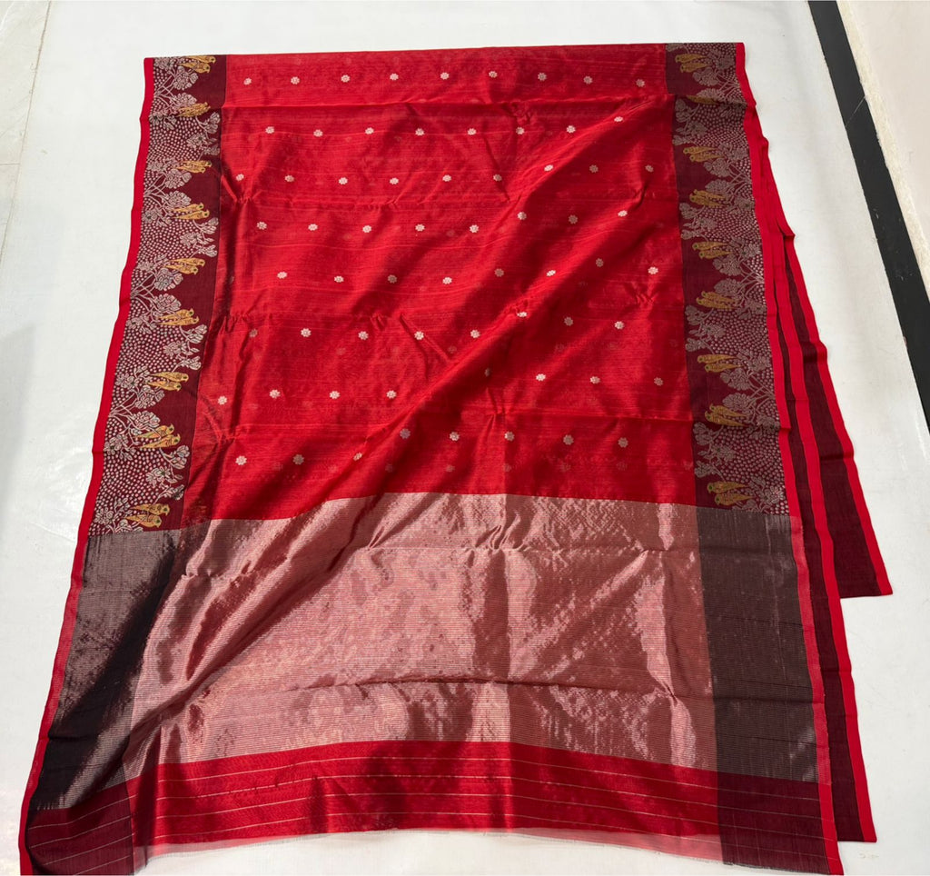 Chanderi handloom pattu silk saree featuring a dark maroon zari border with intricate gold bird motifs, styled with a matching blouse