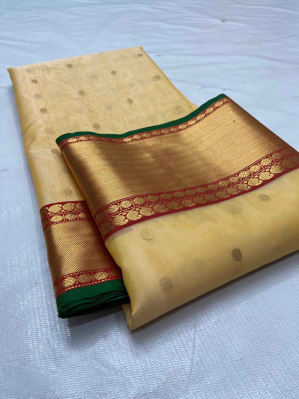 Pale Yellow Chanderi Handloom Katan Silk saree featuring intricate Nakshi borders and a detailed matching Nakshi pallu.